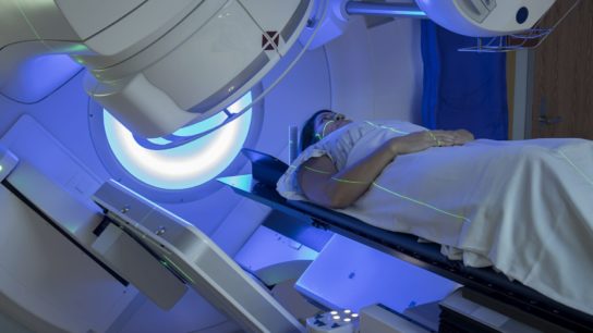woman receiving radiation therapy