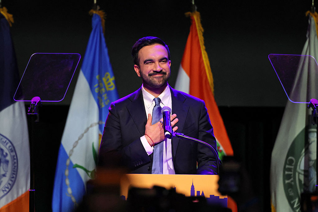 New York City Mayoral candidate Zohran Mamdani stands at podium during an election night event at the Brooklyn Paramount Theater.